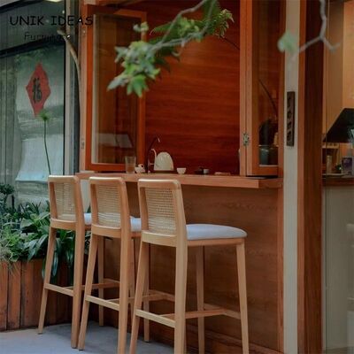 قیمت خوب Nordic Modern Coffee Shop Front Counter High bar Stool Garden Courtyard Creative Solid Wood Hand Made Rattan bar Chair آنلاین