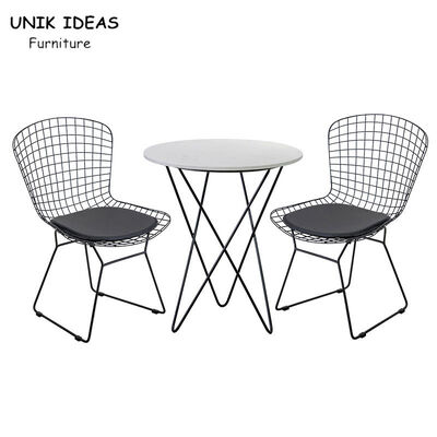 قیمت خوب Wire Metal Frame Dining Chairs And Table With Leather Cushion Black UK-LM006 آنلاین